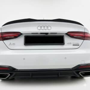 Gloss black rear spoiler cap extension for Audi A5 S-Line F5 Sportback (2016-2019), aggressive roof wing lip for pre-facelift models.