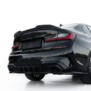 Gloss black rear valance diffuser for BMW M340i G20 Saloon and G21 Touring (2018-2022), aggressive rear bumper styling upgrade.
