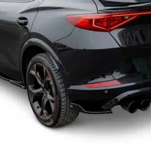 Cupra Formentor gloss black rear side splitter fitted on a black car