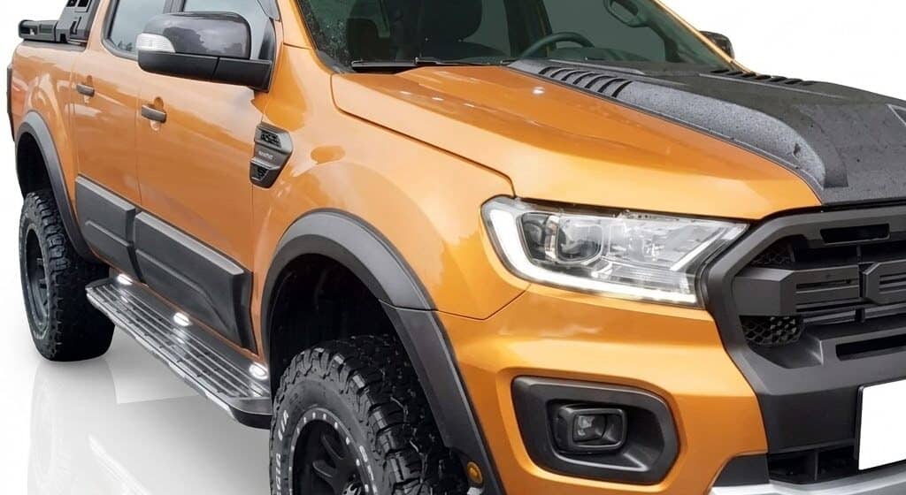Matte black slim fender flares with park assist sensor cutouts for Ford Ranger T8 (2019-2022).
