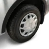 Ford Transit Custom 2012-2018 matte black ABS wheel arch extension kit installed on a white van.