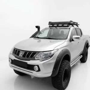 Matte black wide wheel arch extension kit for Mitsubishi L200 Series 5 (2015-2019) Barbarian and Warrior models, rugged off-road styling.