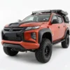 Matte black wide wheel arch extension kit for Mitsubishi L200 Series 6 (2019 onwards), rugged off-road styling for Barbarian X and Warrior models.