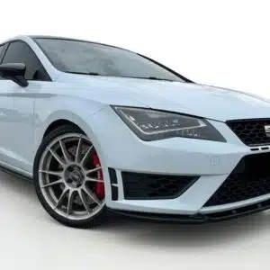 Gloss black front splitter v2 for Seat Leon Mk3 5F FR and Cupra (2012-2016), aggressive pre-facelift front bumper lip.