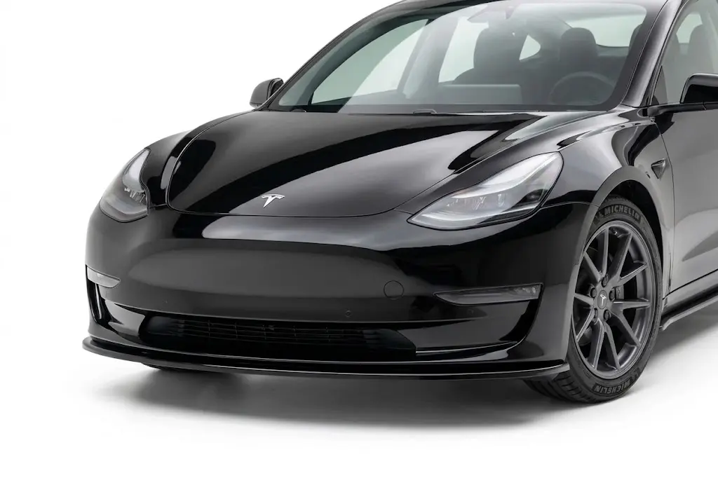 Front Splitter for Tesla Model 3 (2017+) 1 Gloss black front splitter for Tesla Model 3 (2017-2023) - Performance style front lip.