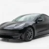 Gloss black front splitter for Tesla Model 3 (2017-2023) - Performance style front lip.