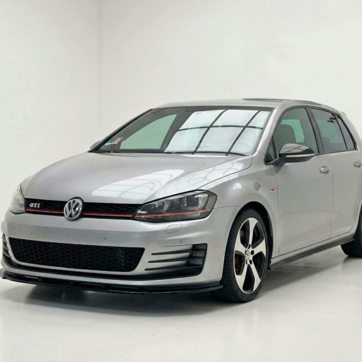 Front Splitter V.1 for VW Golf MK7 GTI / GTD (2013–2016) 4 VW Golf GTI Front Splitter Close-Up Detail Screw Fit Gloss Black ABS MK7