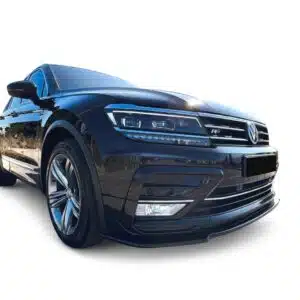 Gloss black front splitter for VW Tiguan Mk2 R-Line (2016-2020), aggressive front bumper lip spoiler for pre-facelift models.