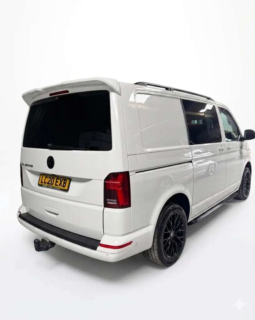 VW T6 - T6.1 2015+ Rear Bumper Protector Cover 1 Black textured rear bumper protector for VW Transporter T6 and T6.1 (2015 onwards), prevents paintwork scratches during loading.